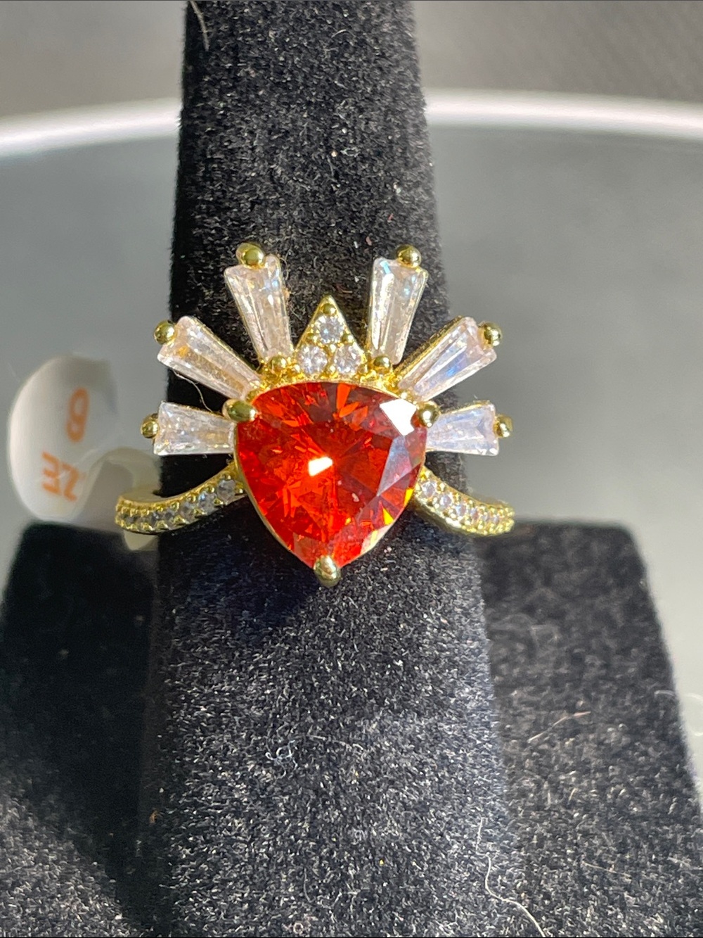 Gold Dipped Ring with Orange Sapphire Center Stone and White Topaz Accent Stones